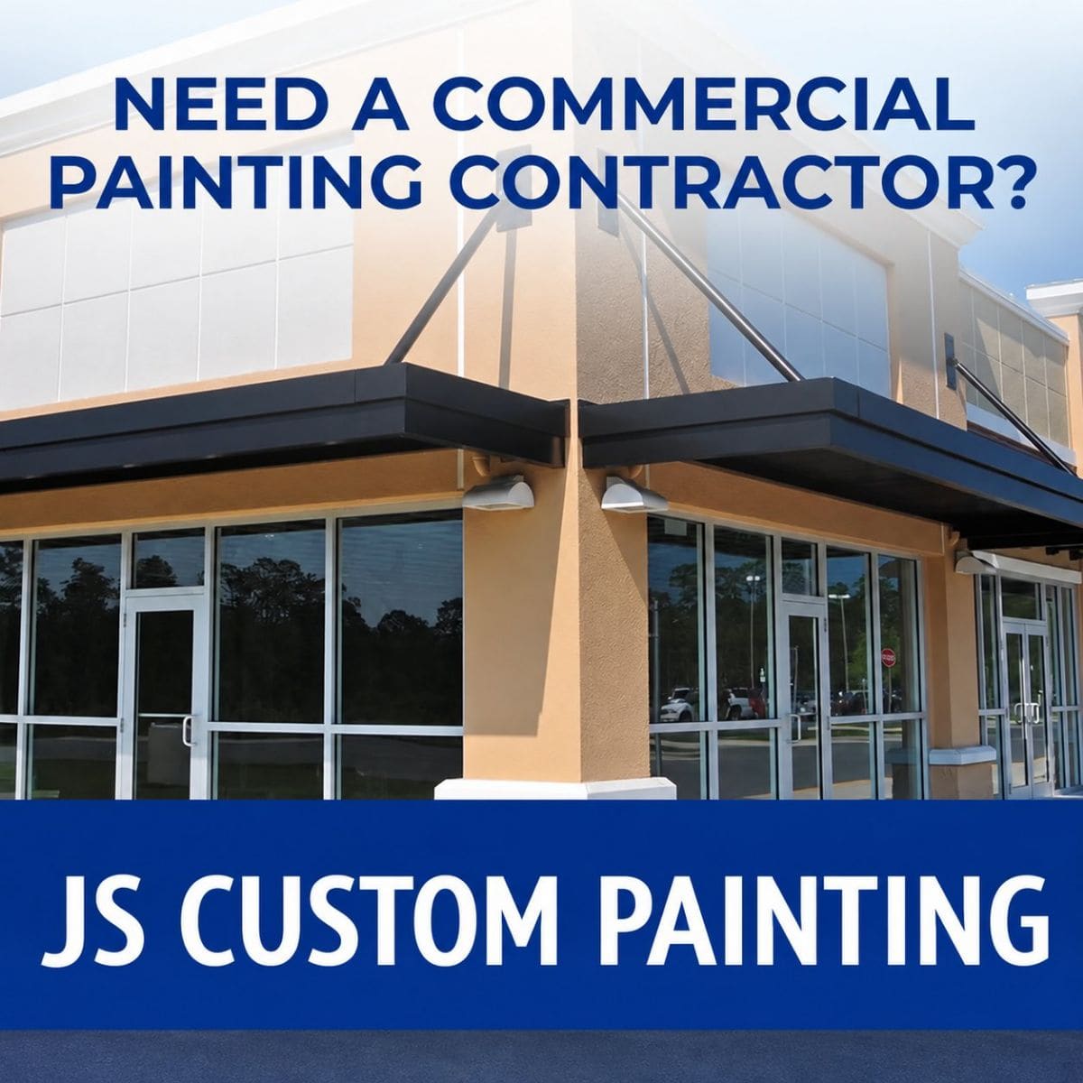 Modern commercial building with tan and black exterior, large windows, and metal roof with promotional text for JS Custom Painting